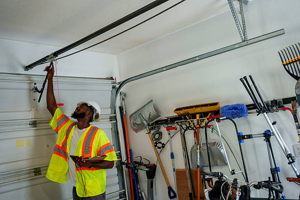 Professional Garage Door Panel Replacement technician working in New Concord, OH